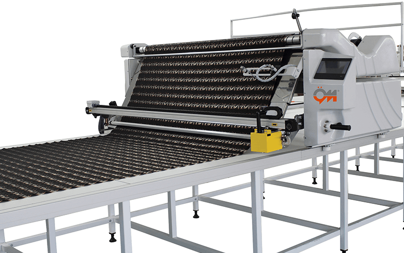 Özer Makina automatic spreading machine